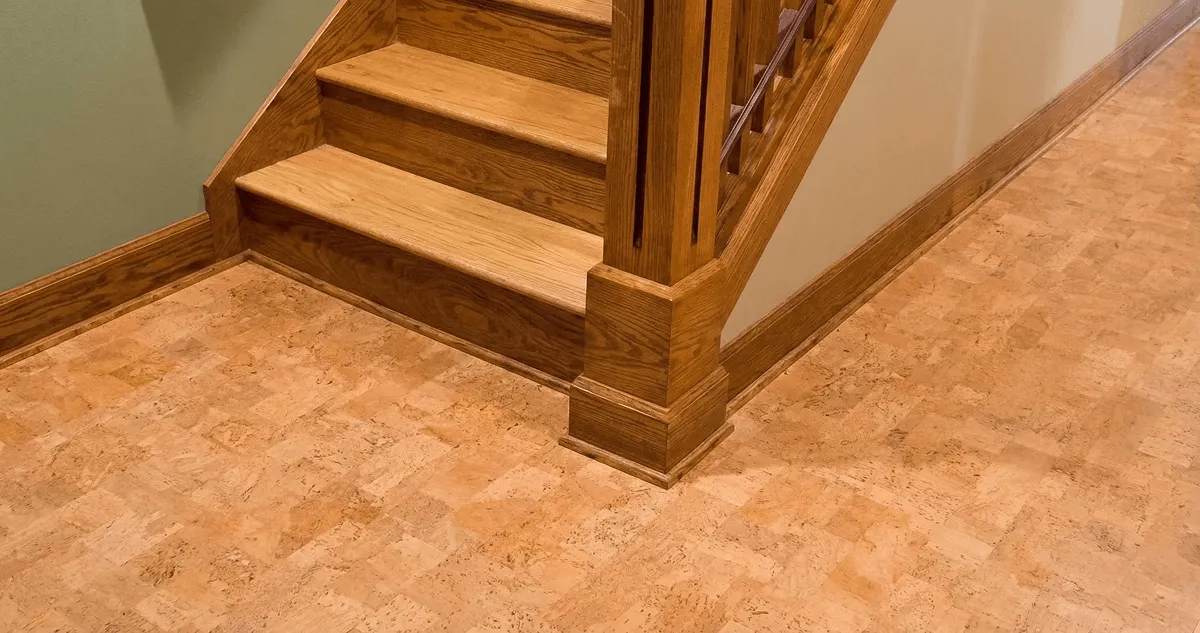 End of a staircase with cork flooring in Bloomington, IN
