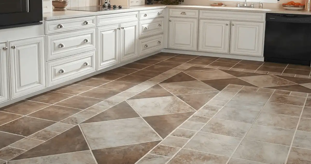 Kitchen with white cabinets and a professionally installed tile floor in Bloomington, IN
